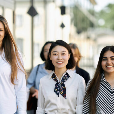 Three HHL students on the HHL campus