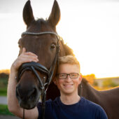 Picture of Daniel Barofke with a horse.